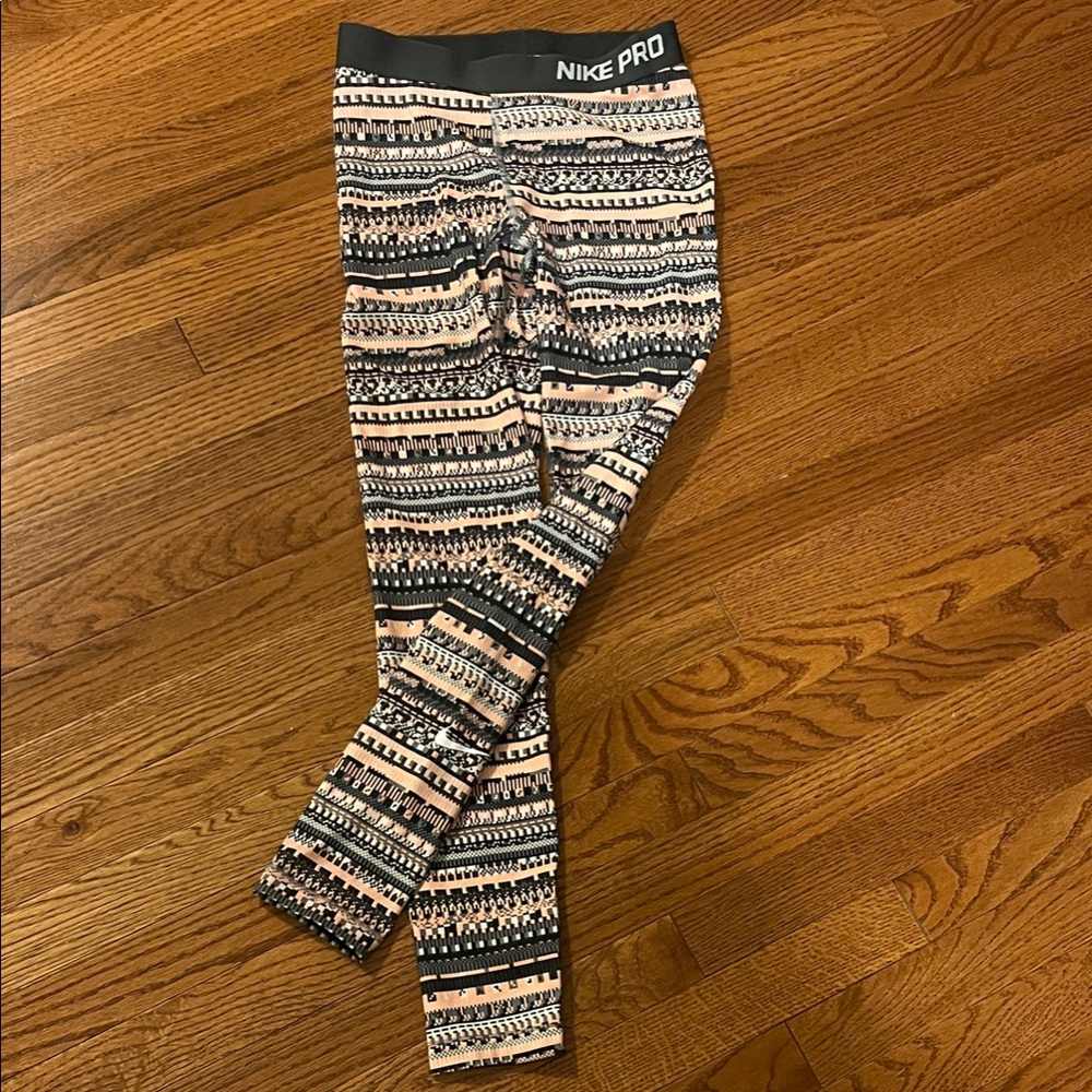 Nike Women’s Black, Gray, and Cream Patterned Leggings with Pink Accents